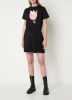 NIKKIE Sunset mini T shirt jurk met print en trekkoord online kopen